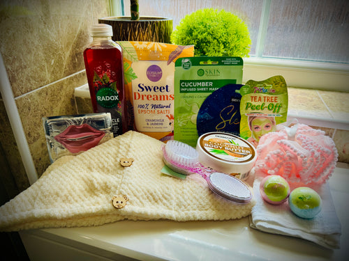 bath and shower gift set with skin care products and beauty tools in a gift box with a handwritten card £30
