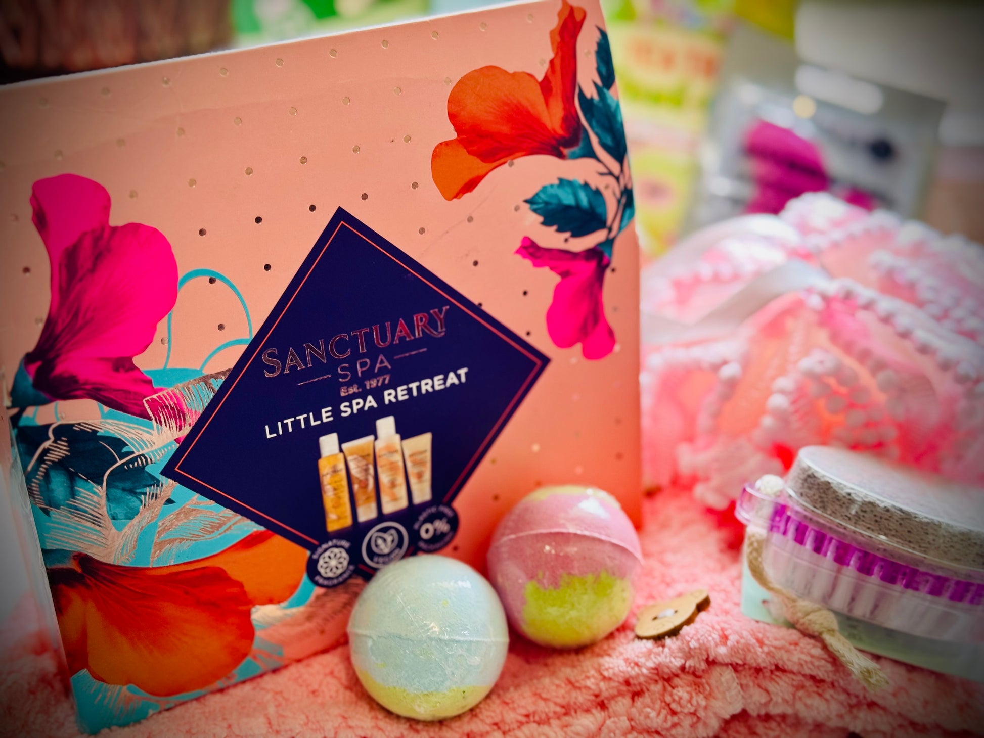 bath and shower gift set with skin care products and beauty tools in a gift box with a handwritten card £50
