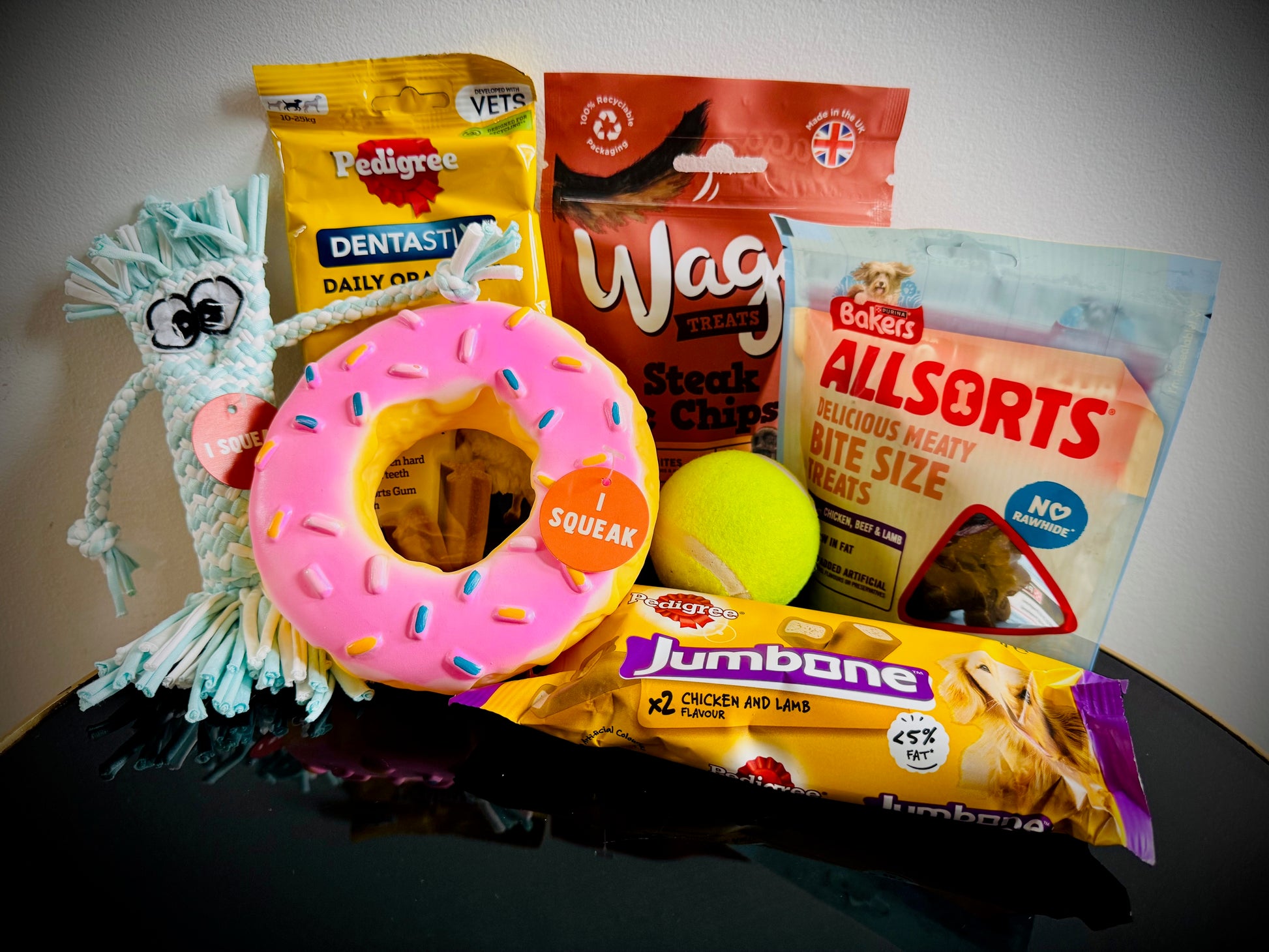 Assorted Dog products including toys and treats birthday gift box with a handwritten card £20
