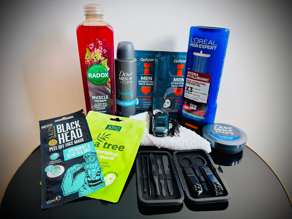 Collection of men's grooming products including face masks, soap, and lotion in a gift box with a handwritten card £30