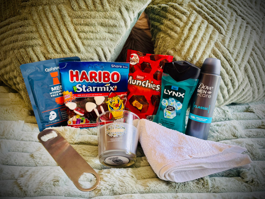 Assorted items including snacks, toiletries, and a candle birthday box with a handwritten card £20